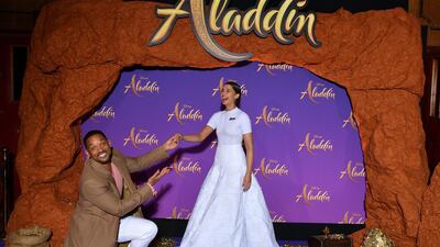 Will Smith larks around with Jasmine actress Naomi Scott. Getty Images