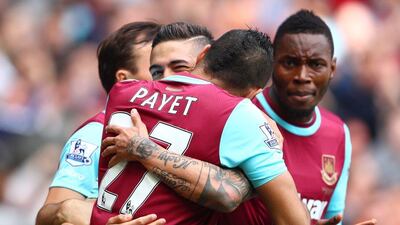 Manuel Lanzini of West Ham United celebrates a goal with Dimitri Payet in the team's Premier League match against Crystal Palace last weekend. Clive Rose / Getty Images / April 2, 2016