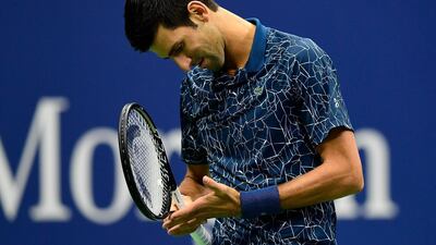 Novak Djokovic of Serbia reacts during his men's Singles finals match against Juan Martin del Potro of Argentina. AFP