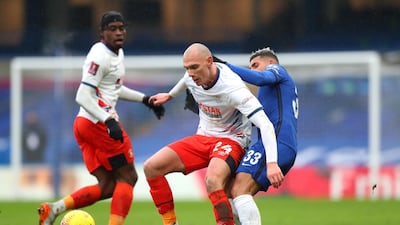 Kal Naismith of Luton Town under pressure from Emerson of Chelsea. Getty