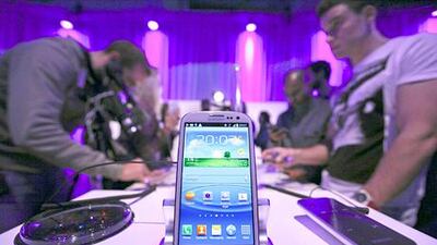 The Galaxy S III has a retail price of Dh2,499. The phone is expected to be the main rival to Apple’s iPhone 5, which is rumoured to be going on sale in the third quarter. Chris Ratcliffe / Bloomberg News