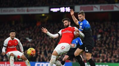 Olivier Giroud of Arsenal plays the ball against Bournemouth on Monday night during their Premier League contest. Shaun Botterill / Getty Images