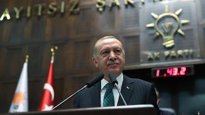 Turkish President Tayyip Erdogan addresses members of parliament from his ruling AK Party (AKP) during a meeting at the Turkish parliament in Ankara, Turkey. Reuters