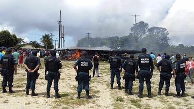 Police try to maintain control as Brazilian people demonstrate against the presence of Venezuelan immigrants in Pacaraima, Brazil. EPA