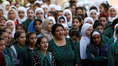 Students and teachers gather at one of the public schools during the first day after the end of teachers' one-month strike in Amman, Jordan. Reuters