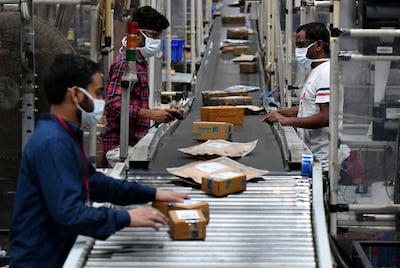 Workers sorting parcels at an Indian e-commerce company. GLP says it wants to solidify its presence in the logistics sector. Reuters