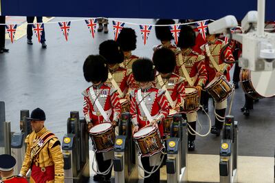 Troops in full military uniform arrive at Waterloo train station from various military barracks before marching across Westminster Bridge. Reuters