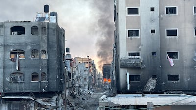 A fire burns inside a Palestinian house amid the continuing Israeli military operation in Beit Lahia. Reuters