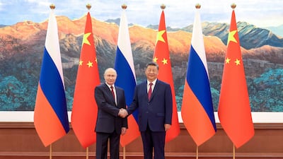 Russian President Vladimir Putin with Chinese President Xi Jinping in Beijing. AFP