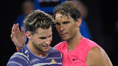 Dominic Thiem, left, is congratulated by Rafael Nadal after winning their quarter-final match at the Australian Open. AP