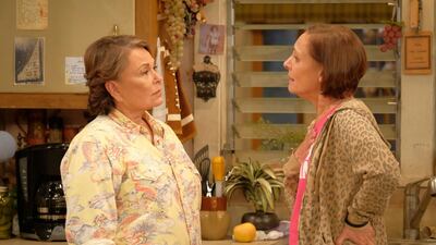 Roseanne Barr, left, and Laurie Metcalf appear in a scene from the reboot of the popular comedy series 'Roseanne.' ABC via AP