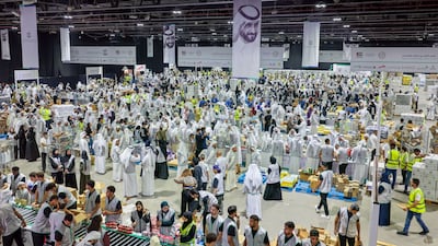 Volunteers turned out in droves to help prepare 10 million meals for Gaza on Saturday. Photo: Wam