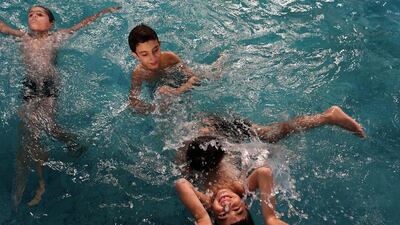 Kids splash about in the school's swimming pool. Courtesy Jenny Gustafsson