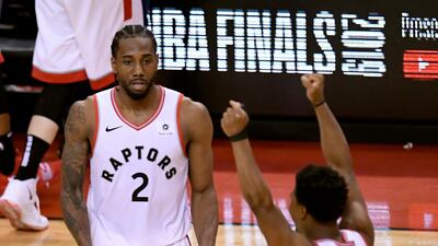 Toronto Raptors' Kawhi Leonard and Kyle Lowry celebrate. AP Photo