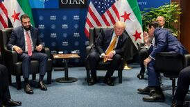 US Secretary of State Marco Rubio speaks to President Donald Trump during a meeting with Syrian President Ahmad Al Shara. Reuters