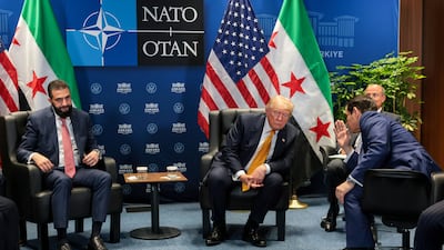 Secretary of State Marco Rubio speaks to President Donald Trump during a bilateral meeting with Syrian President Ahmad Al Shara. Reuters