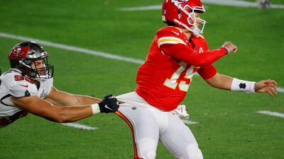 Kansas City Chiefs' Patrick Mahomes in action with Tampa Bay Buccaneers' Anthony Nelson. Reuters