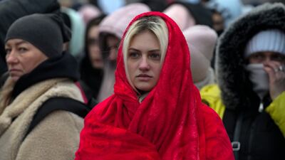 Refugees, mostly women and children, wait for transportation after fleeing Ukraine. AP