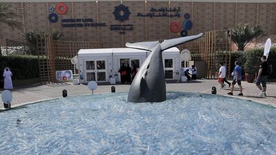 An ocean filled with plastic is shown at the entrance of the First Global Challenge robotics competition.
