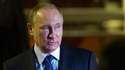 Russian president Vladimir Putin steps off a plane upon arrival for the G20 summit in Hamburg on July 7, 2017. Alexander Zemlianichenko / AP