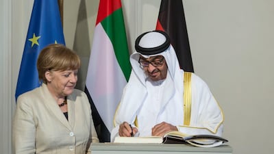 Sheikh Mohamed bin Zayed signs the guest book at Schloss Meseberg Palace on the outskirts of Berlin in May 2016. Ryan Carter / Crown Prince Court - Abu Dhabi