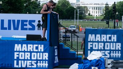 The White House is in view as people prepare for the March for Our Lives rally. AP