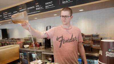 A barista in Philz Coffee shop in San Francisco: coffee sellers will have to post ominous warnings in California because each cup contains a chemical linked to cancer, a judge ruled. Jeff Chiu / AP