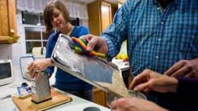 Erin Steinke, 22, a recent graduate, holds two jobs but cannot afford to live independently.