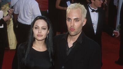 Angelina Jolie, in Marc Bouwer, and James Haven attend the 72nd annual Academy Awards in Los Angeles, California, on March 26, 2000. Getty Images