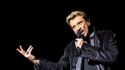 epa06370482 (FILE) A file picture dated 27 October 2006 shows French singer Johnny Hallyday performing on stage during a concert in Brussels, Belgium (reissued 06 December 2017). According to reports on 06 December 2017, French singer and actor Johnny Hallyday died at the age of 74. EPA/ERIC BOMAL BELGIUM OUT