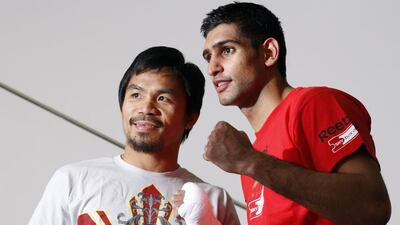 Manny Pacquiao and Amir Khan pose together at a workout in Las Vegas in November 2009. Steve Marcus / Las Vegas Sun / Reuters