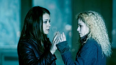Tatiana Maslany as Sarah, left, and her twin Helena, in a scene from Orphan Black. Courtesy BBC America