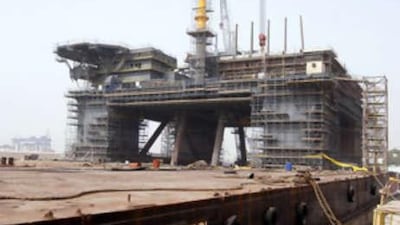 A huge, semi-submersible oil rig being built by the Gulf Piping Company at its shipyard in Mussafah. More Emirati women could be working in the sector thanks to a new initiative.