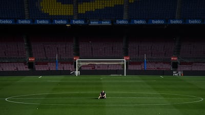 Barcelona's Andres Iniesta sits on the pitch at the match. David Ramos / Getty Images