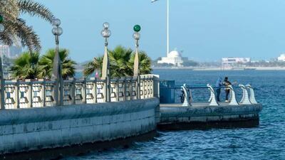Abu Dhabi residents on the Corniche. Victor Besa/The National