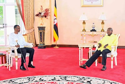 The RSF leader Mohamed Dagalo, left, in Entebbe with Uganda’s President Yoweri Museveni. AFP