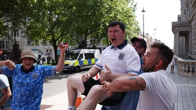 England football fans celebrate their team's win in central London. Reuters
