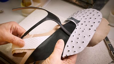 Assembling the different parts of the upper of the shoes. Louis Vuitton Malletier / Grégoire Vieille