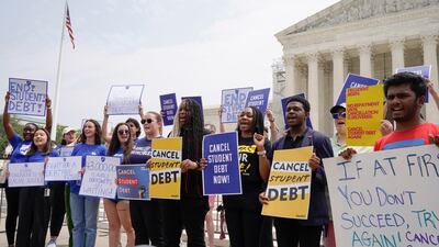 Protesters demand the cancellation of student debt outside the Supreme Court in Washington. AP