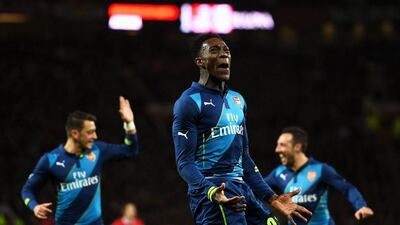 Danny Welbeck of Arsenal celebrates scoring his team's winning goal in the 2-1 FA Cup quarter-final victory over Manchester United on Monday night at Old Trafford. Laurence Griffiths / Getty Images