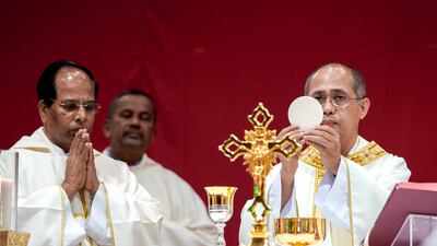 Christians in the UAE gathered for the traditional Christmas Eve mass at St Joseph's Cathedral in Abu Dhabi. All photos: Victor Besa / The National