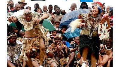 The South African president, Jacob Zuma, sings and dances with his wife, Thobeka Madiba, at their wedding ceremony on Monday. She is his third current wife. Rajesh Jantilal / AFP