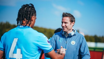 Manchester City academy chief Thomas Kruecken, right, is helping to nurture the next generation of players at the Premier League club. Photo: Manchester City