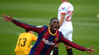 Barcelona's Ousmane Dembele celebrates after his first-half strike against Sevilla. AFP
