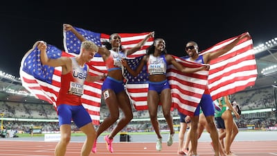 US runners jump for joy after winning gold in the 4x400m mixed relay at the World Athletics Championships in Budapest, Hungary. Getty Images
