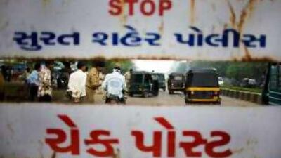 Most of the world's diamonds are cut in Surat. A checkpoint in Surat city, where local authorities have battled bomb threats.