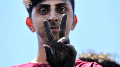An Iraqi protester gestures in the capital Baghdad on May 11, 2020. AFP