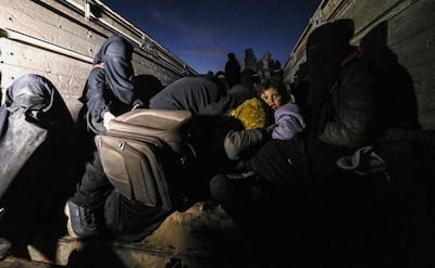 Families fleeing the conflict in Deir Ezzor, Syria Delil Souleiman / AFP