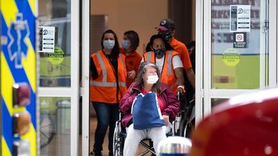 Officials on Tuesday began removing dozens of people who have been sleeping at the city's airport during the coronavirus pandemic. AP