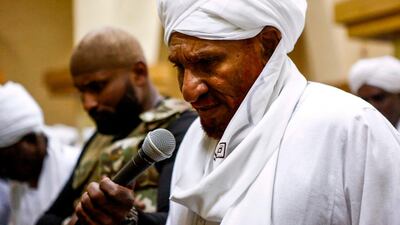 Sadiq Al Mahdi, Sudan's ex-prime minister and leader of the opposition Umma Party, prays in a mosque in the capital Khartoum's twin city of Omdurman. AFP